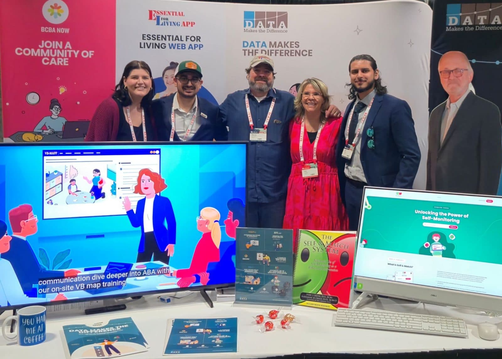 The Data Makes The Difference team at a conference